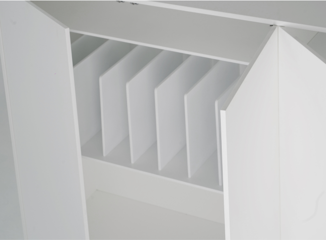 A close-up of the interior of a minimalist white sideboard. The doors are open, revealing several vertical dividers within one of the compartments. 